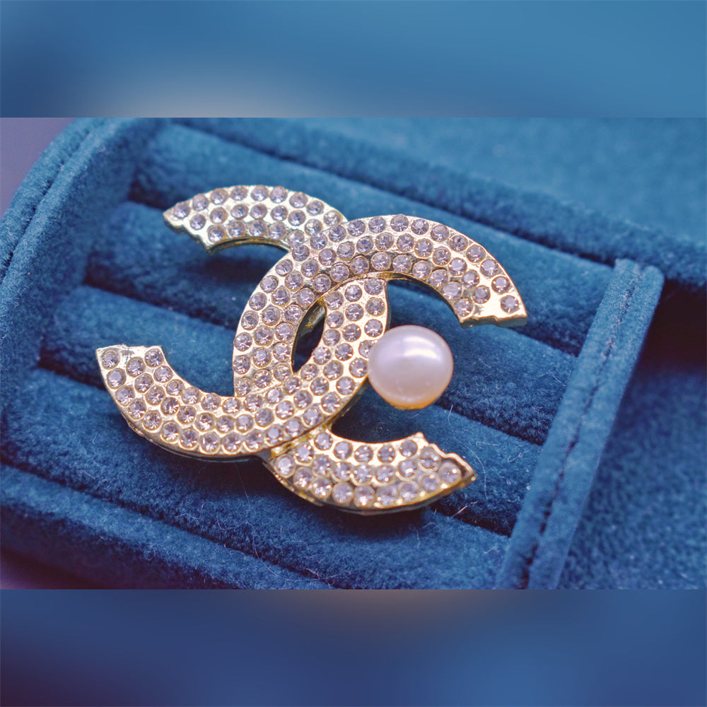 Silver CC pearl outlet brooch